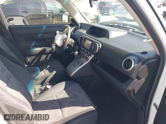 2014 Scion xB with VIN JTLZE4FE5EJ065953, listed as a IAAI auction lot 41850554 with 124,856 mi miles. Bid and sale history available at carsss.com. Image 5.