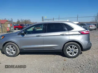 2020 Ford Edge SEL z VIN 2FMPK4J93LBB01318, wystawiony jako IAAI lot #42038334 z przebiegiem 73 435 mil mil oraz . Historia ofert i sprzedaży dostępna na DreamBid. Obrazek 14.