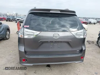 2015 Toyota Sienna SE with VIN 5TDXK3DC8FS652966, listed as a IAAI auction lot 41576611 with 108,858 mi miles and . Bid and sale history available at DreamBid. Image 16.