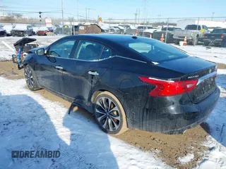 2017 Nissan Maxima SV z VIN 1N4AA6AP1HC434427, wystawiony jako IAAI lot #41607323 z przebiegiem 102 352 mil mil oraz . Historia ofert i sprzedaży dostępna na DreamBid. Obrazek 3.