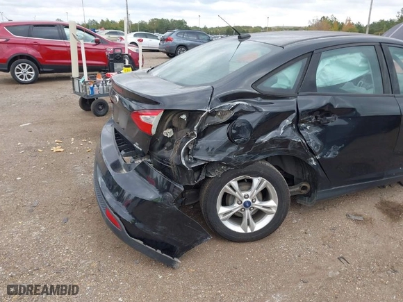 2014 Ford Focus SE with VIN 1FADP3F2XEL293022, listed as a IAAI auction lot 40737196 with 188,228 mi miles. Bid and sale history available at carsss.com. Image 6.