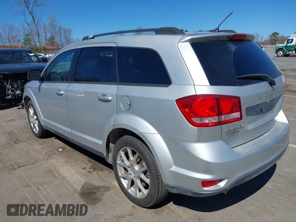 2014 Dodge Journey SXT z VIN 3C4PDCBG7ET227470, wystawiony jako IAAI lot #41843128 z przebiegiem 98 195 mil mil oraz . Historia ofert i sprzedaży dostępna na DreamBid. Obrazek 3.