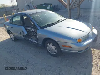 2001 Saturn SL z VIN 1G8ZH528X1Z330896, wystawiony jako IAAI lot #42104170 z przebiegiem 136 290 mil mil oraz . Historia ofert i sprzedaży dostępna na DreamBid. Obrazek 1.