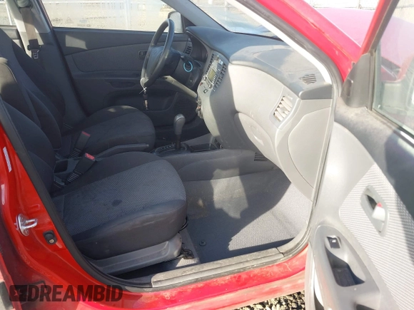2009 Kia Rio LX with VIN KNADE223796485606, listed as a IAAI auction lot 41676881 with 58,852 mi miles and . Bid and sale history available at DreamBid. Image 5.
