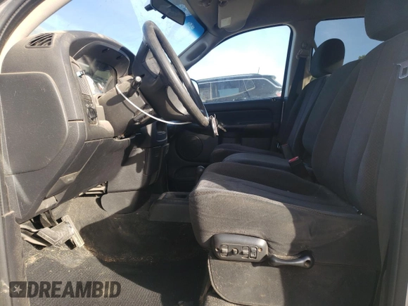 2003 Dodge 1500 with VIN 1D3HU18Z53J508034, listed as a Copart auction lot 84736694 with 198,526 mi miles and Salvage Title. Bid and sale history available at DreamBid. Image 7.