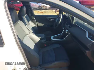 2023 Toyota RAV4 Hybrid XSE with VIN 2T3E6RFV1PW038080, listed as a IAAI auction lot 42518107 with 14,430 mi miles and . Bid and sale history available at DreamBid. Image 5.