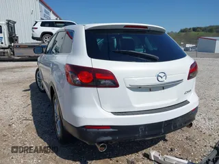 2013 Mazda CX-9 Grand Touring with VIN JM3TB2DA3D0403697, listed as a IAAI auction lot 41976262 with 127,117 mi miles and . Bid and sale history available at DreamBid. Image 3.