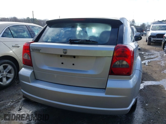 2008 Dodge Caliber SE with VIN 1B3HB28B48D502983, listed as a IAAI auction lot 41429571 with 185,487 mi miles and . Bid and sale history available at DreamBid. Image 16.