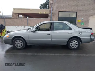 1998 Toyota Camry LE z VIN JT2BG22K7W0225872, wystawiony jako IAAI lot #41252434 z przebiegiem 160 763 mil mil oraz . Historia ofert i sprzedaży dostępna na DreamBid. Obrazek 14.