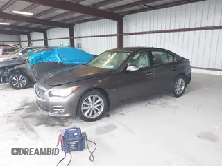 2015 Infiniti Q50 Premium z VIN JN1BV7AR0FM393387, wystawiony jako IAAI lot #42257850 z przebiegiem 176 436 mil mil oraz . Historia ofert i sprzedaży dostępna na DreamBid. Obrazek 17.