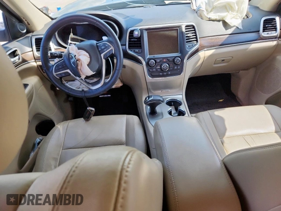 2014 Jeep Grand Cherokee Limited with VIN 1C4RJFBG9EC121990, listed as a Copart auction lot 64079495 with 98,615 mi miles and Salvage title. Bid and sale history available at DreamBid. Image 8.