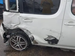 2009 Nissan Cube SL z VIN JN8AZ28R09T107493, wystawiony jako IAAI lot #41895404 z przebiegiem 190 656 mil mil oraz . Historia ofert i sprzedaży dostępna na DreamBid. Obrazek 6.