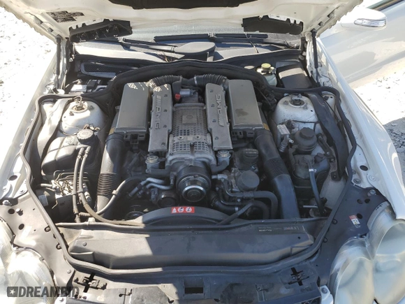2005 Mercedes-Benz SL-Class 5.5L AMG with VIN WDBSK74F35F101434, listed as a Copart auction lot 77668344 with 94,471 mi miles and Salvage Title. Bid and sale history available at carsss.com. Image 11.