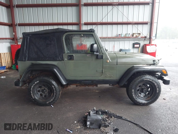2005 Jeep Wrangler X z VIN 1J4FA39S75P310037, wystawiony jako IAAI lot #42186114 z przebiegiem 154 462 mil mil oraz . Historia ofert i sprzedaży dostępna na DreamBid. Obrazek 13.