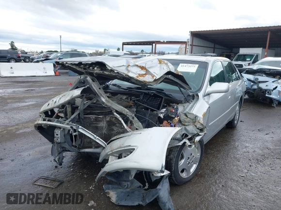 2004 Toyota Avalon XL with VIN 4T1BF28B44U364702, listed as a IAAI auction lot 41473272 with 226,845 mi miles. Bid and sale history available at carsss.com. Image 6.