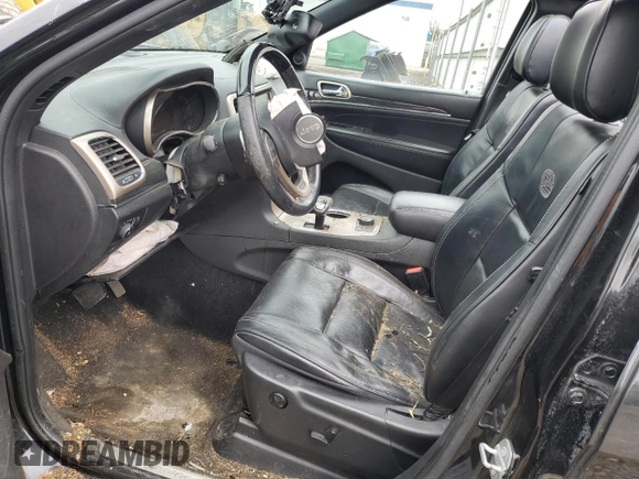 2015 Jeep Grand Cherokee Overland with VIN 1C4RJFCG2FC912328, listed as a Copart auction lot 46112005 with 170,366 mi miles and Salvage Title. Bid and sale history available at carsss.com. Image 7.