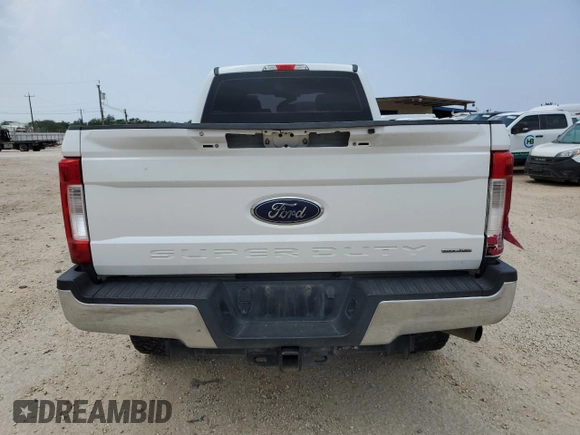 2017 Ford F-250 Lariat with VIN 1FT7W2B62HEE65243, listed as a Copart auction lot 55686505 with 212,089 mi miles and Salvage title. Bid and sale history available at DreamBid. Image 6.