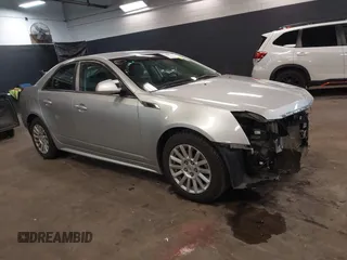 2012 Cadillac CTS with VIN 1G6DC5E59C0137598, listed as a IAAI auction lot 41660569 with 59,380 mi miles and . Bid and sale history available at DreamBid. Image 1.