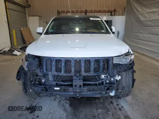 2015 Jeep Grand Cherokee Summit with VIN 1C4RJFJG1FC226591, listed as a Copart auction lot 52926115 with 130,803 mi miles and Salvage Title. Bid and sale history available at DreamBid. Image 5.