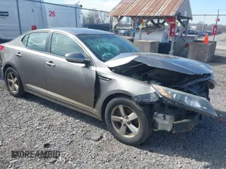 2014 Kia Optima LX with VIN 5XXGM4A79EG287804, listed as a IAAI auction lot 41824981 with 191,213 mi miles. Bid and sale history available at carsss.com. Image 1.