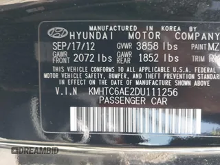 2013 Hyundai Veloster Turbo с VIN KMHTC6AE2DU111256, выставлен на аукционе IAAI как лот 42796383 с пробегом 127 660 миль миль и . История ставок и продаж доступна на DreamBid. Изображение 9.