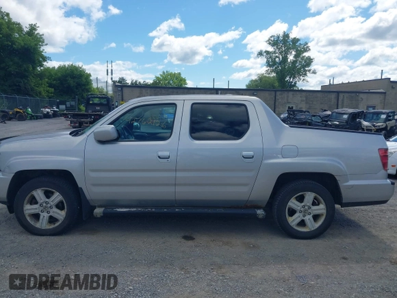 2013 Honda Ridgeline RTL with VIN 5FPYK1F51DB007236, listed as a IAAI auction lot 42762126 with 201,758 mi miles and . Bid and sale history available at DreamBid. Image 14.