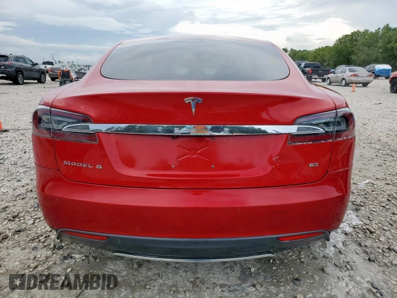 2014 Tesla Model S 60 with VIN 5YJSA1H11EFP43669, listed as a Copart auction lot 62368605 with Not provided miles and Salvage title. Bid and sale history available at DreamBid. Image 6.
