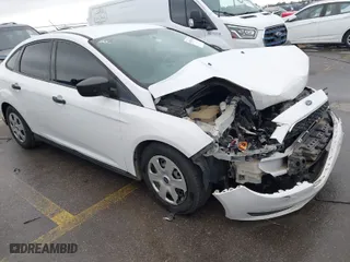 2018 Ford Focus S with VIN 1FADP3E24JL284750, listed as a IAAI auction lot 41673433 with 124,443 mi miles. Bid and sale history available at carsss.com. Image 1.