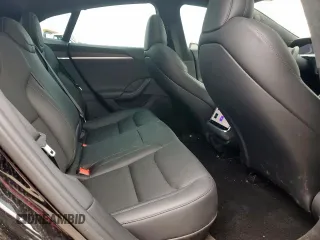 2023 Tesla Model S with VIN 5YJSA1E59PF512318, listed as a Copart auction lot 58377895 with 34,402 mi miles and Salvage title. Bid and sale history available at DreamBid. Image 10.
