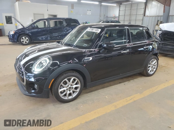 2021 MINI Hardtop 4 Door Oxford Edition with VIN WMWXU7C08M2N79978, listed as a Copart auction lot 61961105 with 29,714 mi miles and Salvage title. Bid and sale history available at DreamBid. Image 1.