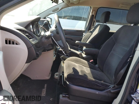 2014 Dodge Grand Caravan American Value with VIN 2C4RDGBG5ER260339, listed as a Copart auction lot 54533055 with 188,952 mi miles and Clean Title. Bid and sale history available at DreamBid. Image 7.