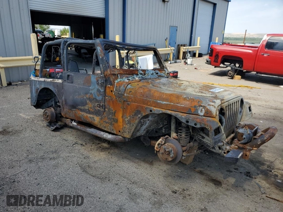1999 Jeep Wrangler Sport with VIN 1J4FY19S3XP468927, listed as a Copart auction lot 64190184 with 0 mi miles and Non Repairable. Bid and sale history available at carsss.com. Image 4.