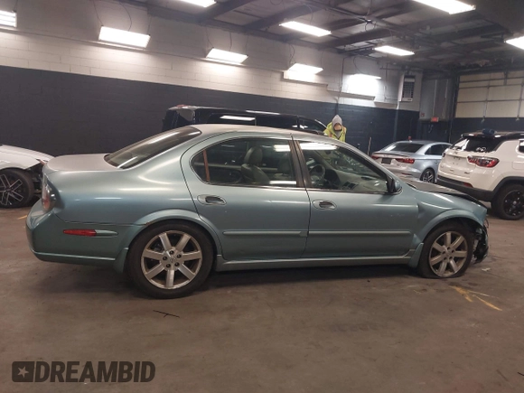 2002 Nissan Maxima GLE z VIN JN1DA31A12T308581, wystawiony jako IAAI lot #41742949 z przebiegiem 116 892 mil mil oraz . Historia ofert i sprzedaży dostępna na DreamBid. Obrazek 13.