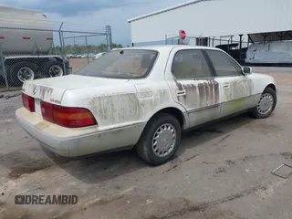 1991 Lexus LS z VIN JT8UF11E6M0075970, wystawiony jako IAAI lot #41872951 z przebiegiem 217 251 mil mil oraz . Historia ofert i sprzedaży dostępna na DreamBid. Obrazek 4.