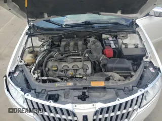 2012 Lincoln MKZ z VIN 3LNHL2JC7CR810191, wystawiony jako Copart lot #59125485 z przebiegiem 154 076 mil mil oraz Szkoda całkowita • Salvage title. Historia ofert i sprzedaży dostępna na DreamBid. Obrazek 11.
