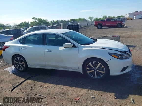 2017 Nissan Altima SV z VIN 1N4AL3AP0HC125959, wystawiony jako IAAI lot #42176500 z przebiegiem 146 838 mil mil oraz . Historia ofert i sprzedaży dostępna na DreamBid. Obrazek 13.