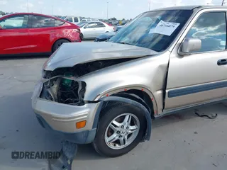 2000 Honda CR-V SE with VIN JHLRD1873YC039813, listed as a IAAI auction lot 40716079 with 214,067 mi miles. Bid and sale history available at carsss.com. Image 19.