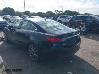 2017 Mazda Mazda6 Touring with VIN JM1GL1V52H1128973, listed as a IAAI auction lot 41661300 with 131,721 mi miles. Bid and sale history available at carsss.com. Image 3.