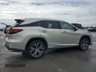 2020 Lexus RX 350L with VIN JTJHZKEA8L2017253, listed as a Copart auction lot 60213465 with 62,422 mi miles and Salvage title. Bid and sale history available at DreamBid. Image 3.