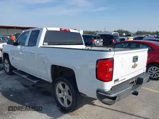 2014 Chevrolet Silverado 1500 LT with VIN 1GCRCREH0EZ399724, listed as a IAAI auction lot 41572451 with 61,799 mi miles and . Bid and sale history available at DreamBid. Image 3.