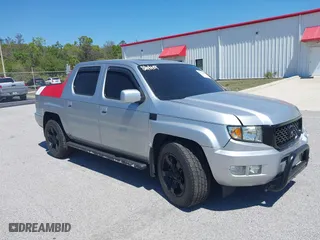 2012 Honda Ridgeline RTL with VIN 5FPYK1F5XCB452203, listed as a IAAI auction lot 41816014 with 147,647 mi miles. Bid and sale history available at carsss.com. Image 1.