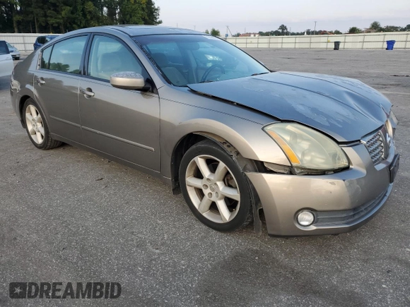 2004 Nissan Maxima SE with VIN 1N4BA41E24C878448, listed as a Copart auction lot 72596984 with 329,525 mi miles and Salvage Title. Bid and sale history available at carsss.com. Image 4.
