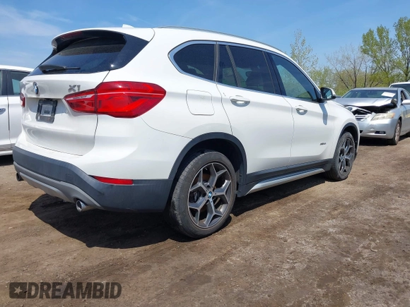 2018 BMW X1 xDrive28i with VIN WBXHT3C39J5F91912, listed as a IAAI auction lot 42099647 with 79,023 mi miles and . Bid and sale history available at DreamBid. Image 4.