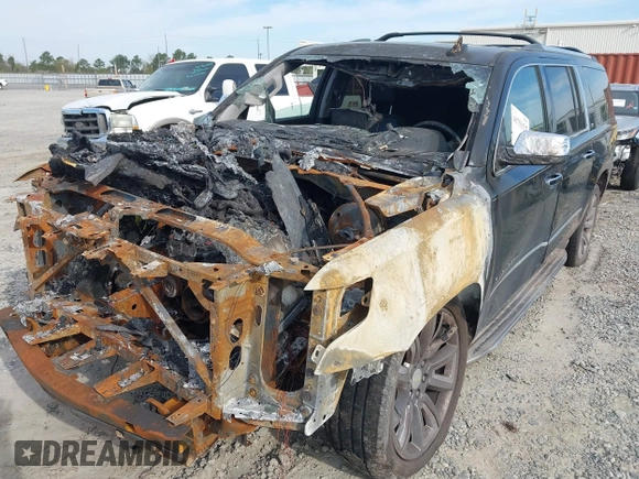 2015 Chevrolet Suburban LTZ with VIN 1GNSCKKC2FR509683, listed as a IAAI auction lot 41751537 with 189,590 mi miles and . Bid and sale history available at DreamBid. Image 6.