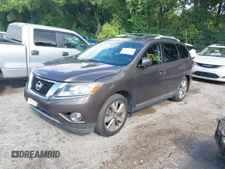 2015 Nissan Pathfinder Platinum with VIN 5N1AR2MM4FC603779, listed as a IAAI auction lot 42731531 with 103,385 mi miles and . Bid and sale history available at DreamBid. Image 2.
