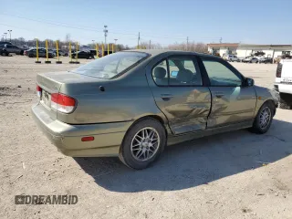2000 Infiniti G20 Luxury z VIN JNKCP11A5YT311938, wystawiony jako Copart lot #48509185 z przebiegiem 186 595 mil mil oraz Szkoda całkowita • Salvage title. Historia ofert i sprzedaży dostępna na DreamBid. Obrazek 3.