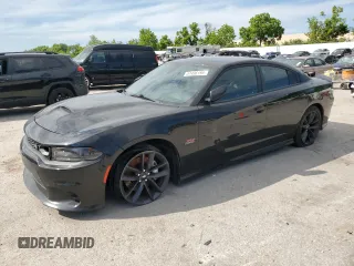 2019 Dodge Charger Scat Pack z VIN 2C3CDXGJ7KH579130, wystawiony jako Copart lot #57436195 z przebiegiem 116 644 mil mil oraz Szkoda całkowita • Salvage title. Historia ofert i sprzedaży dostępna na DreamBid. Obrazek 1.