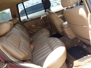 2000 Jeep Grand Cherokee Laredo with VIN 1J4G258S4YC381030, listed as a IAAI auction lot 42541918 with 306,934 mi miles and . Bid and sale history available at DreamBid. Image 8.