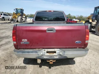 1999 Ford F-150 XL z VIN 1FTRX18L3XNA61248, wystawiony jako Copart lot #56355005 z przebiegiem Nie podano mil oraz Nie do naprawy • Non repairable. Historia ofert i sprzedaży dostępna na DreamBid. Obrazek 6.