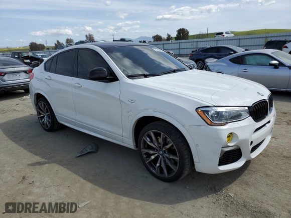 2018 BMW X4 M40i with VIN 5UXXW7C57J0W63952, listed as a Copart auction lot 47435363 with 67,198 mi miles. Bid and sale history available at carsss.com. Image 4.